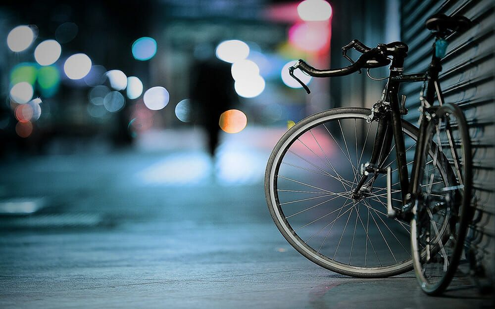 Bike on the street at night.